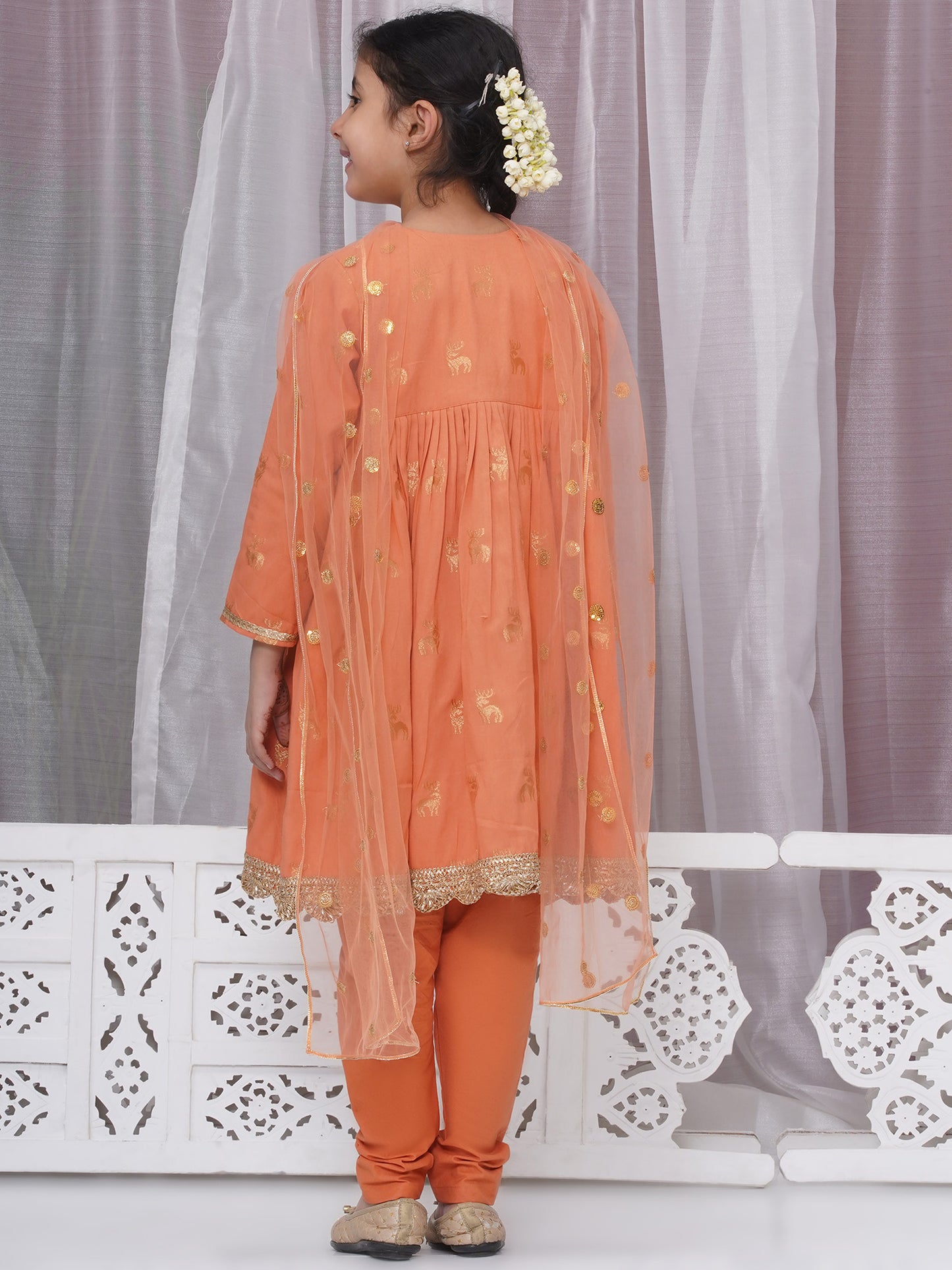Girls festive dull orange Angrakha -pajami suit