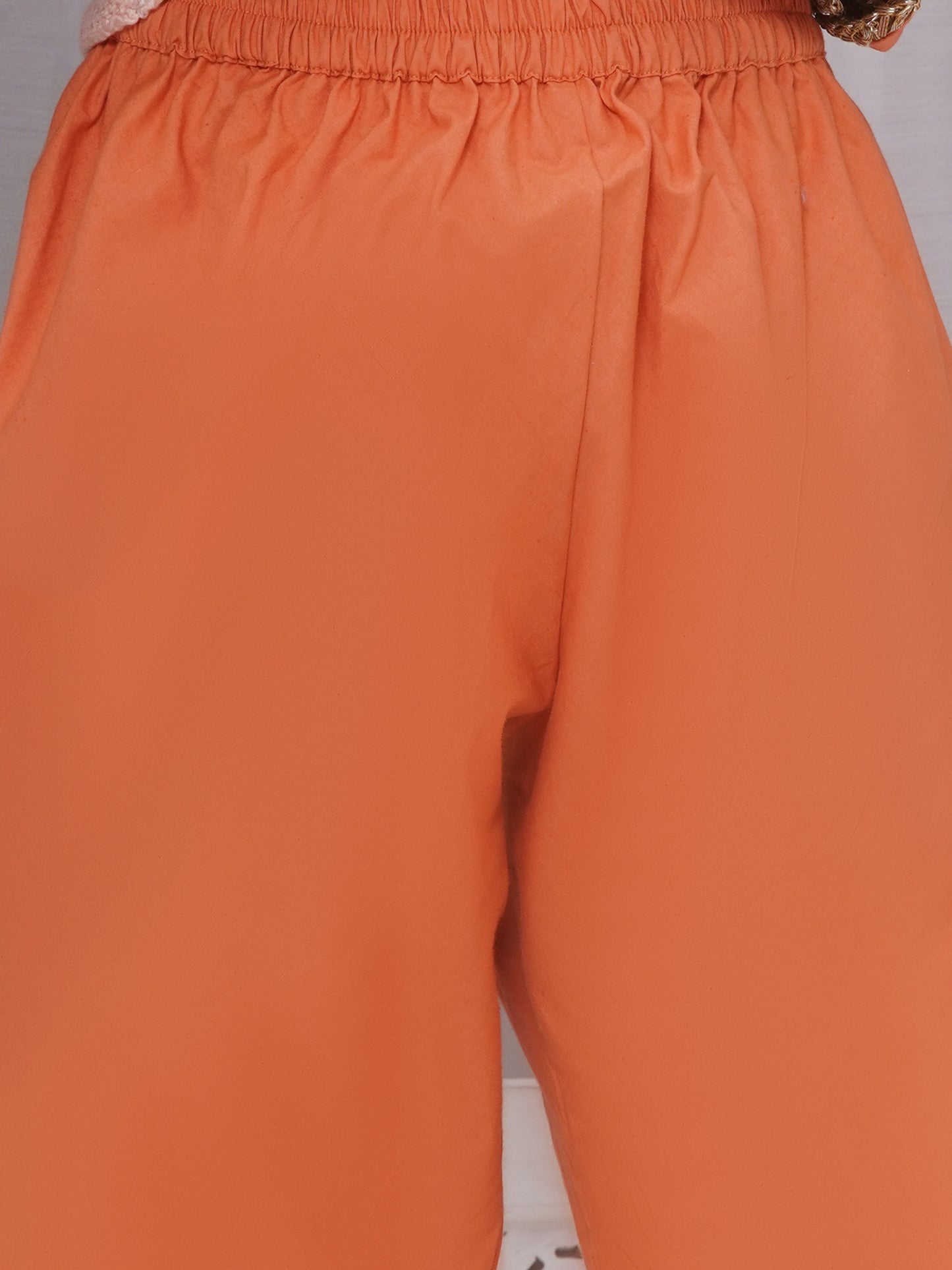 Girls festive dull orange Angrakha -pajami suit