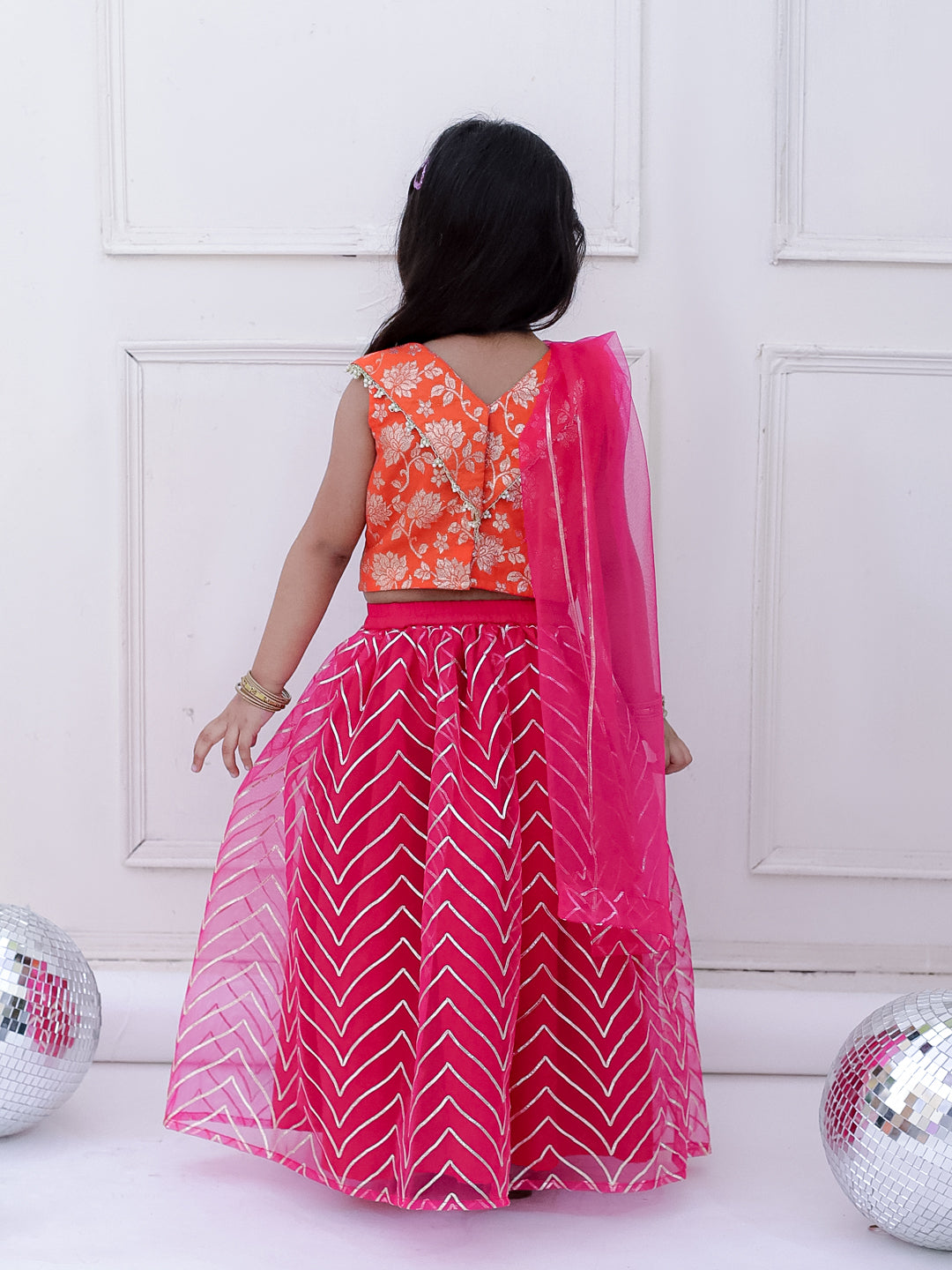 Girls Banarasi top with zigzag pattern net lehnga set