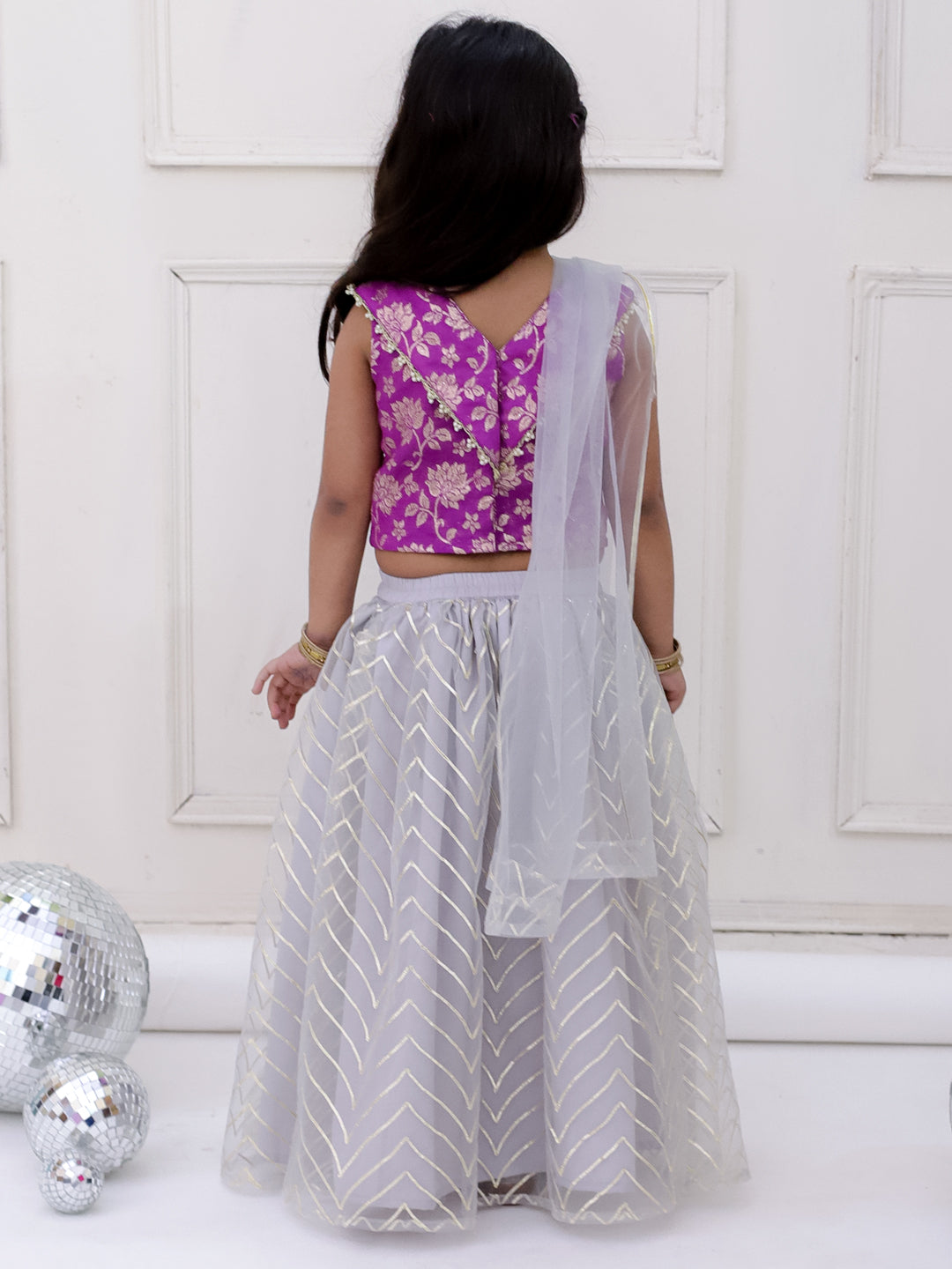 Girls Banarasi top with zigzag pattern net lehnga set